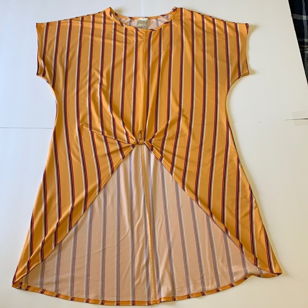 Top fashion of ny 1X Yellow high low wrap shirt with red black & white stripes.